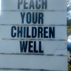 Hosmer Mountain Bottling - The sign out front for advertising new flavors and specials, and a little local humor