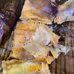 Tamal De Mole Negro En Hoja De Plátano / Black Mole Tamale in Banana Leaf