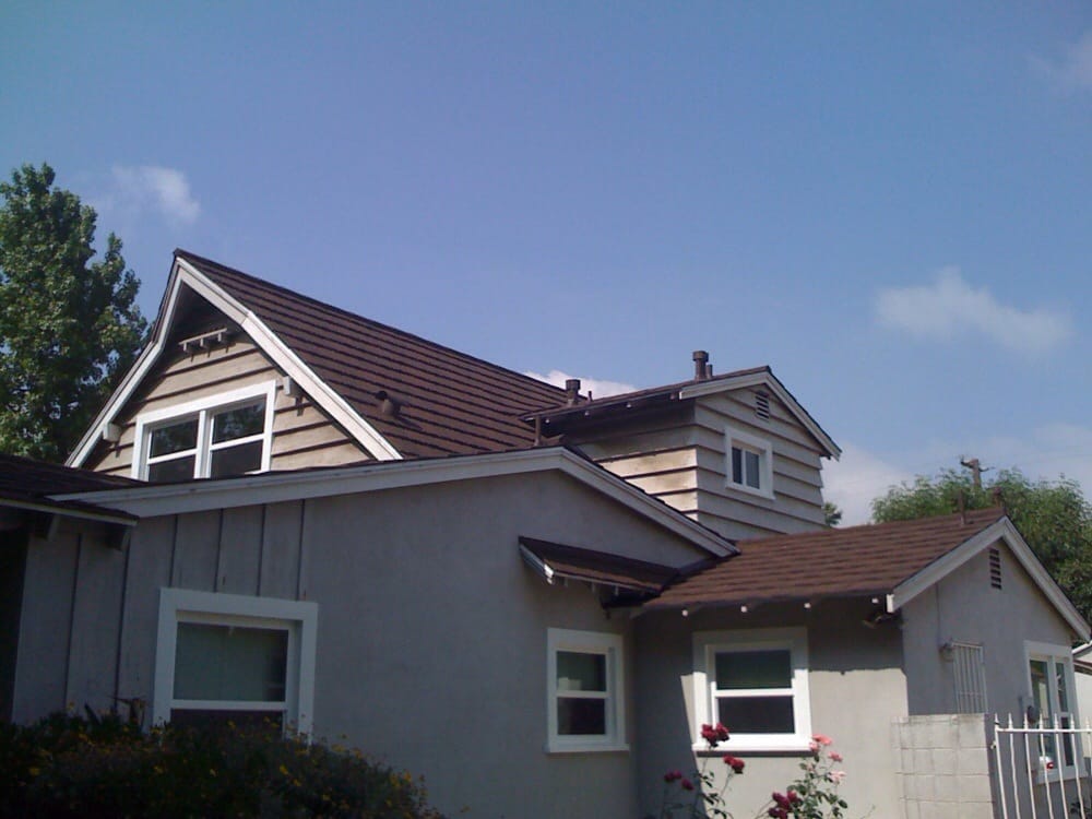 Slide of JW Roofing Services