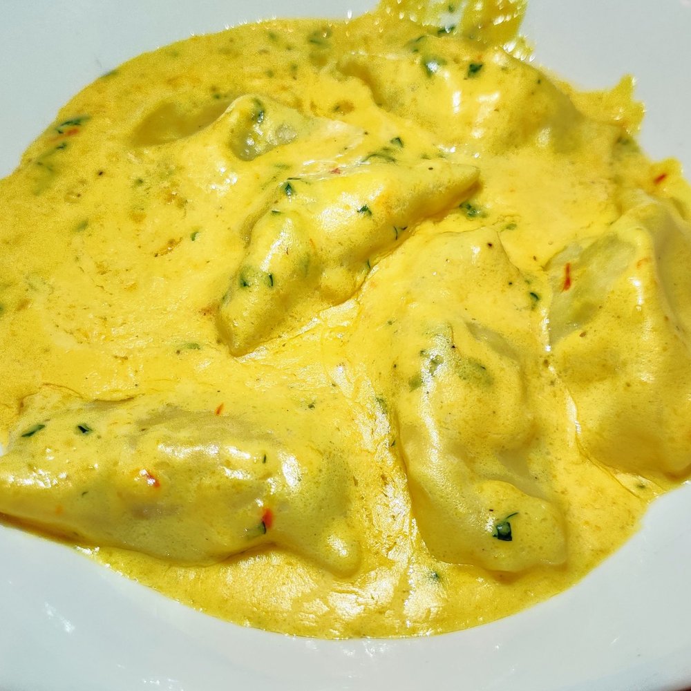 Moya - Crab meat filled housemade agnolotti in a bomb cream sauce - New American Near Me - Jim Thorpe, Pennsylvania Moya - Crab meat filled housemade agnolotti in a bomb cream sauce - New American Near Me - Jim Thorpe, Pennsylvania