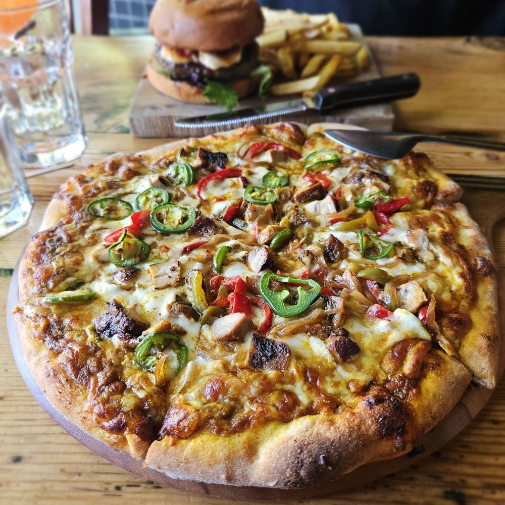 Tipsy Yeti Restaurant & Bar - Himalayan Pizza - Sports Bars Near Me - Berkeley, California Tipsy Yeti Restaurant & Bar - Himalayan Pizza - Sports Bars Near Me - Berkeley, California