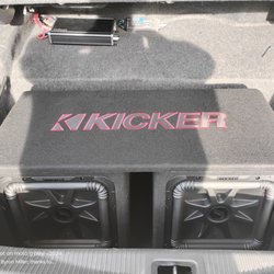 Advanced Audio - Kicker subwoofers in box with amp, installed.