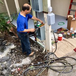 Sakamoto Electric - Rick installing a new meter at our house.  He put the whole thing up himself, and did a great job.