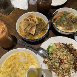 Tea Leaf Salad with Anchovies, Coconut Chicken Noodle Soup, Goat Curry, Samosa Salad with Bean Soup