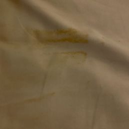 Mysterious yellow/brown stain on sheets