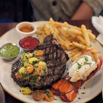 Water Street Cafe - 14 oz ribeye steak with lobster add on - Italian Near Me - Vancouver, British Columbia Water Street Cafe - 14 oz ribeye steak with lobster add on - Italian Near Me - Vancouver, British Columbia