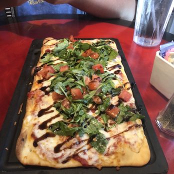 Rainforest Cafe - Mozzarella Flatbread With Arugula - American Near Me - San Antonio, Texas Rainforest Cafe - Mozzarella Flatbread With Arugula - American Near Me - San Antonio, Texas