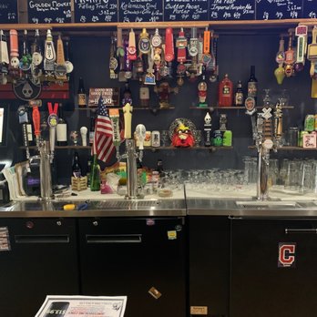 The Wine Room & Tavern - a bar with a lot of liquor - Wine Bars Near Me - Avon, Ohio