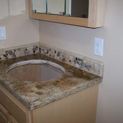 Di Salvo Tile and Stone - Vanity top with granite ,splash flat stone borderliner