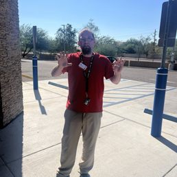 Kyle the operations manager in front of the store smoking Kyle the operations manager in front of the store smoking