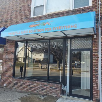 Q&K Solutions - a blue awning on a brick building - Juice Bars & Smoothies Near Me - Havertown, Pennsylvania Q&K Solutions - a blue awning on a brick building - Juice Bars & Smoothies Near Me - Havertown, Pennsylvania