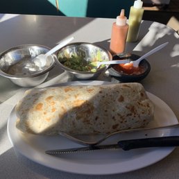 Regular chicken Fajitas Burrito w/ Avocado and sides of Guacamole and Sour Cream Regular chicken Fajitas Burrito w/ Avocado and sides of Guacamole and Sour Cream