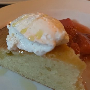 La Pecora Bianca SoHo - Olive oil cake with strawberries and rhubarb - Mediterranean Near Me - New York, New York La Pecora Bianca SoHo - Olive oil cake with strawberries and rhubarb - Mediterranean Near Me - New York, New York
