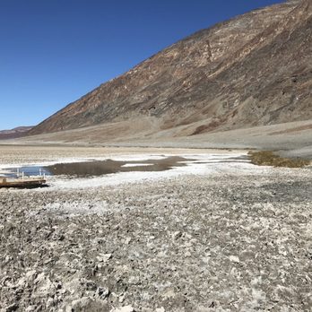 Badwater Basin - Looking toward the salt flats and the pool from the path - Landmarks & Historical Buildings Near Me - Death Valley, California