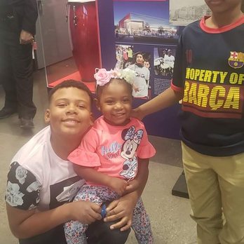 McDonald's - a man and two children posing for a picture - Burgers Near Me - Mitchellville, Maryland McDonald's - a man and two children posing for a picture - Burgers Near Me - Mitchellville, Maryland