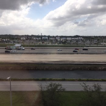 IKEA - View of the new strip mall across the turnpike and the Everglades beyond it. Great for sunsets. - Furniture Stores Near Me - Miami, Florida