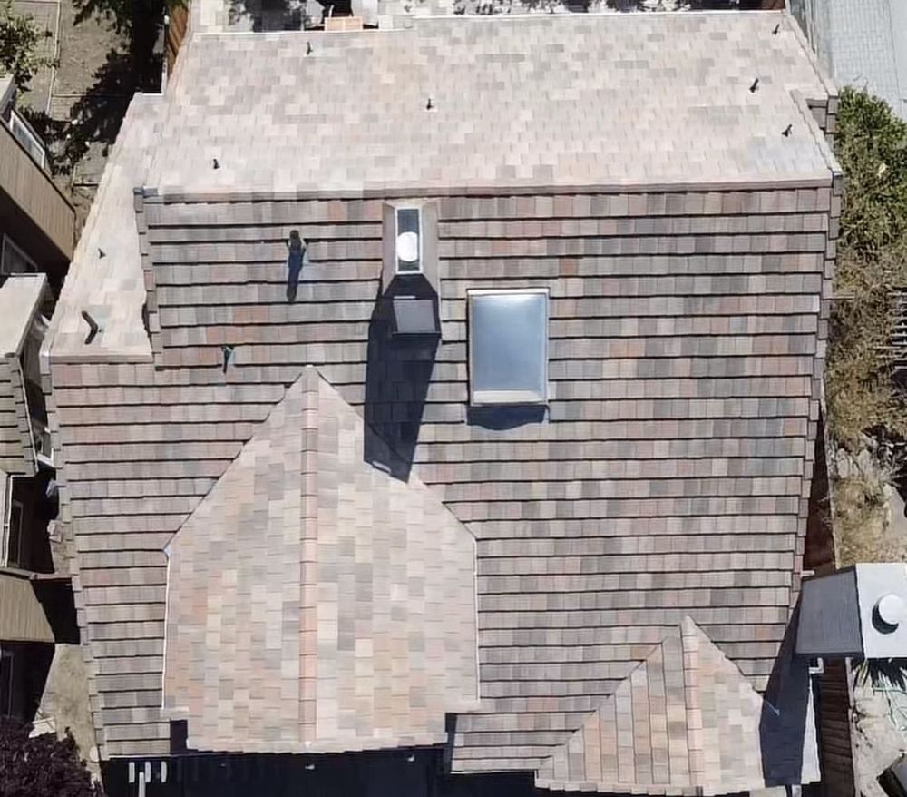 Slide of Exclusively Roofing