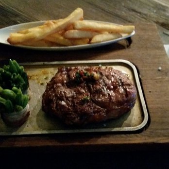 Gran Fierro - BLUE RibEye steak with green bean wrapped in bacon and good ol' French fries - Argentine Near Me - Prague, Puerto Rico Gran Fierro - BLUE RibEye steak with green bean wrapped in bacon and good ol' French fries - Argentine Near Me - Prague, Puerto Rico