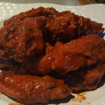Legends Grill - a plate of chicken wings - Sports Bars Near Me - Stafford, Texas