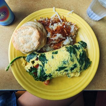 Geraldine's Counter - Spinach, feta, basil & tomato omelet with hashbrowns and a biscuit - American Near Me - Seattle, Washington Geraldine's Counter - Spinach, feta, basil & tomato omelet with hashbrowns and a biscuit - American Near Me - Seattle, Washington