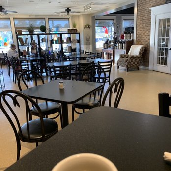 Baker's Sweets Bistro & Bakery - a cup of coffee on a table - Bakeries Near Me - Sumter, South Carolina
