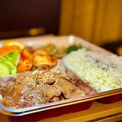 Anjin - Yakiniku Beef bento box (bbq beef, sautéed bean sprouts, rice, salad, Home Made Kimchi, 2 types of japchae, & sautéed spinach.)