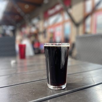 Burger Me - a glass of beer on a table - Burgers Near Me - Truckee, California