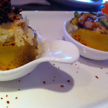 iSushi - this was delicious! No idea what it was... torched mango with fish inside? - Sushi Bars Near Me - Castro Valley, California