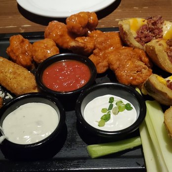 TGI Fridays Front Royal - a platter of appetizers and dips - American Near Me - Front Royal, Virginia TGI Fridays Front Royal - a platter of appetizers and dips - American Near Me - Front Royal, Virginia