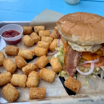 Hops & Hounds - Bacon Cheeseburger with a fried egg and tater tots. - Dog Parks Near Me - San Antonio, Texas Hops & Hounds - Bacon Cheeseburger with a fried egg and tater tots. - Dog Parks Near Me - San Antonio, Texas