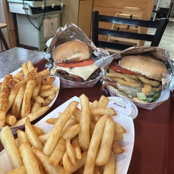 Papa Joe's Humble Kitchen - Right side steakhouse burger and small fry. Left side bacon cheeseburger and small Cajun fries. - American Near Me - Milford, New Hampshire Papa Joe's Humble Kitchen - Right side steakhouse burger and small fry. Left side bacon cheeseburger and small Cajun fries. - American Near Me - Milford, New Hampshire