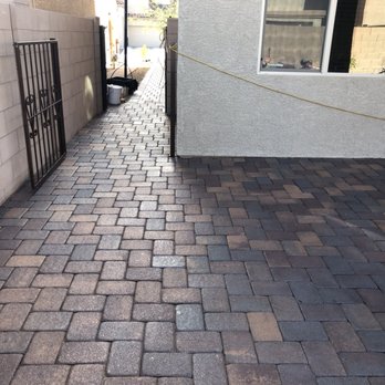 Innovative Epoxy Floors - a brick walkway with a gate - Flooring Near Me Innovative Epoxy Floors - a brick walkway with a gate - Flooring Near Me
