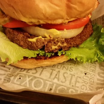 Fuddruckers - Half pound hamburger with a heaping amount of toppings from the bar 5.99 - Burgers Near Me - Albuquerque, New Mexico Fuddruckers - Half pound hamburger with a heaping amount of toppings from the bar 5.99 - Burgers Near Me - Albuquerque, New Mexico