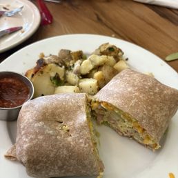 California breakfast burrito with side of potato's California breakfast burrito with side of potato's