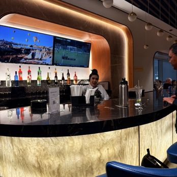 Avianca Lounge - Bar tender incredible service - Airport Lounges Near Me - Miami, Florida Avianca Lounge - Bar tender incredible service - Airport Lounges Near Me - Miami, Florida
