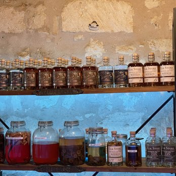 Elk Store Winery & Distillery - bottles of alcohol on shelves - Wine Bars Near Me - Fredericksburg, Texas