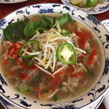 Pho Nam - Pho Dac Biet (with toppings and a lot of sriracha) - Vietnamese Near Me - Cornelius, North Carolina Pho Nam - Pho Dac Biet (with toppings and a lot of sriracha) - Vietnamese Near Me - Cornelius, North Carolina