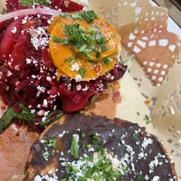 Enchilada and tostada con frijoles...had finished the rest! Enchilada and tostada con frijoles...had finished the rest!