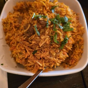 Sathi - Lamb biryani...that lamb was plentiful under and in that rice. - Indian Near Me - New York, New York