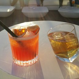 The "oh lala" specialty cocktail on left - Jack Daniels with water on right