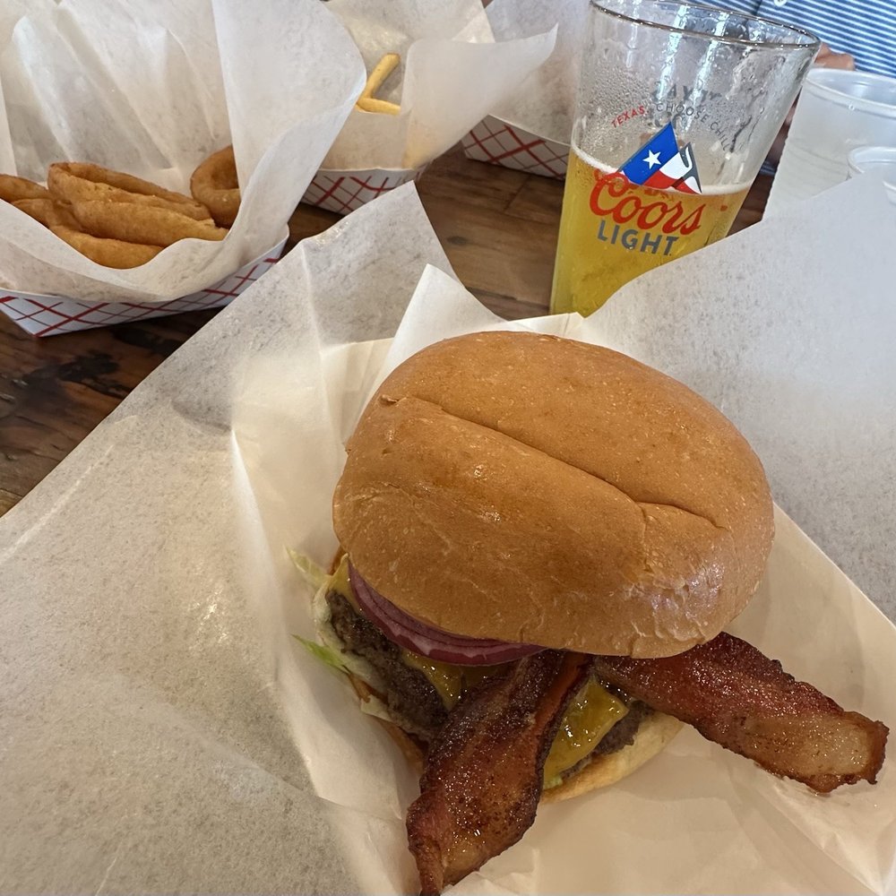 Bacon Cheeseburger with fries, onion rings and tots Bacon Cheeseburger with fries, onion rings and tots