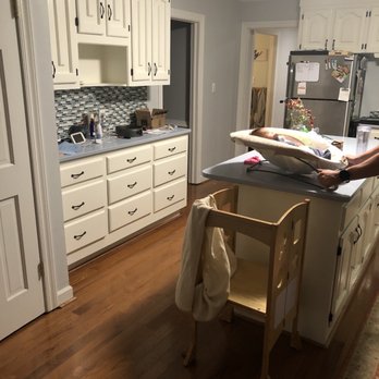 The Handyman Stop - a kitchen with white cabinets - Handyman Near Me The Handyman Stop - a kitchen with white cabinets - Handyman Near Me