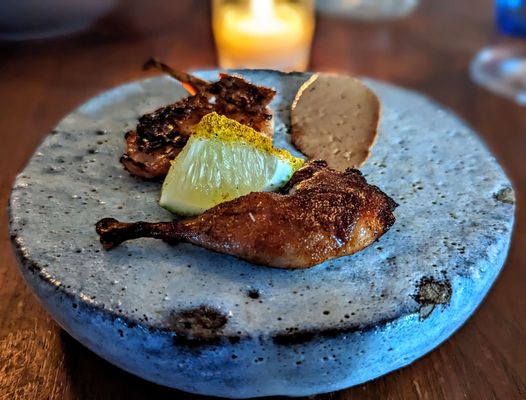 Photo of Friday Saturday Sunday - Philadelphia, PA, US. Grilled quail with jerk spices and a smear of pate. One of the best things I've eaten in a while.