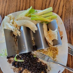 Rundown Cafe - Excess tortilla, giant chunks of raw green onion, beans not worth finishing
