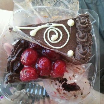 C'est Si Bon Bakery - Chocolate mousse cake and slice of kiss of death (flourless cake). - Bakeries Near Me - Newport Beach, California C'est Si Bon Bakery - Chocolate mousse cake and slice of kiss of death (flourless cake). - Bakeries Near Me - Newport Beach, California
