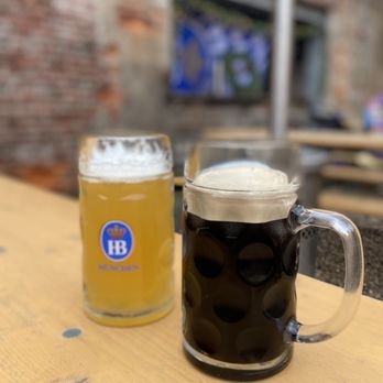 Frankford Hall - two mugs of beer on a table - German Near Me - Philadelphia, Pennsylvania Frankford Hall - two mugs of beer on a table - German Near Me - Philadelphia, Pennsylvania