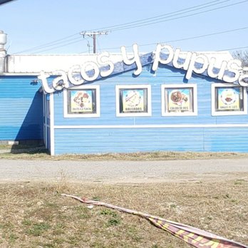 Tacos y Pupusas - a blue building with a sign that says tacos y pupusas - Salvadoran Near Me - McKinney, Texas
