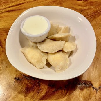 Paradise Village Hotel - Farmers cheese pierogis w/sour cream. - Hotels Near Me - Ashford, Washington Paradise Village Hotel - Farmers cheese pierogis w/sour cream. - Hotels Near Me - Ashford, Washington