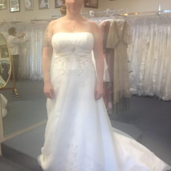 Bridal Veil Fashions - Trying on my dress in the store. - Bridal Near Me - Capitola, California