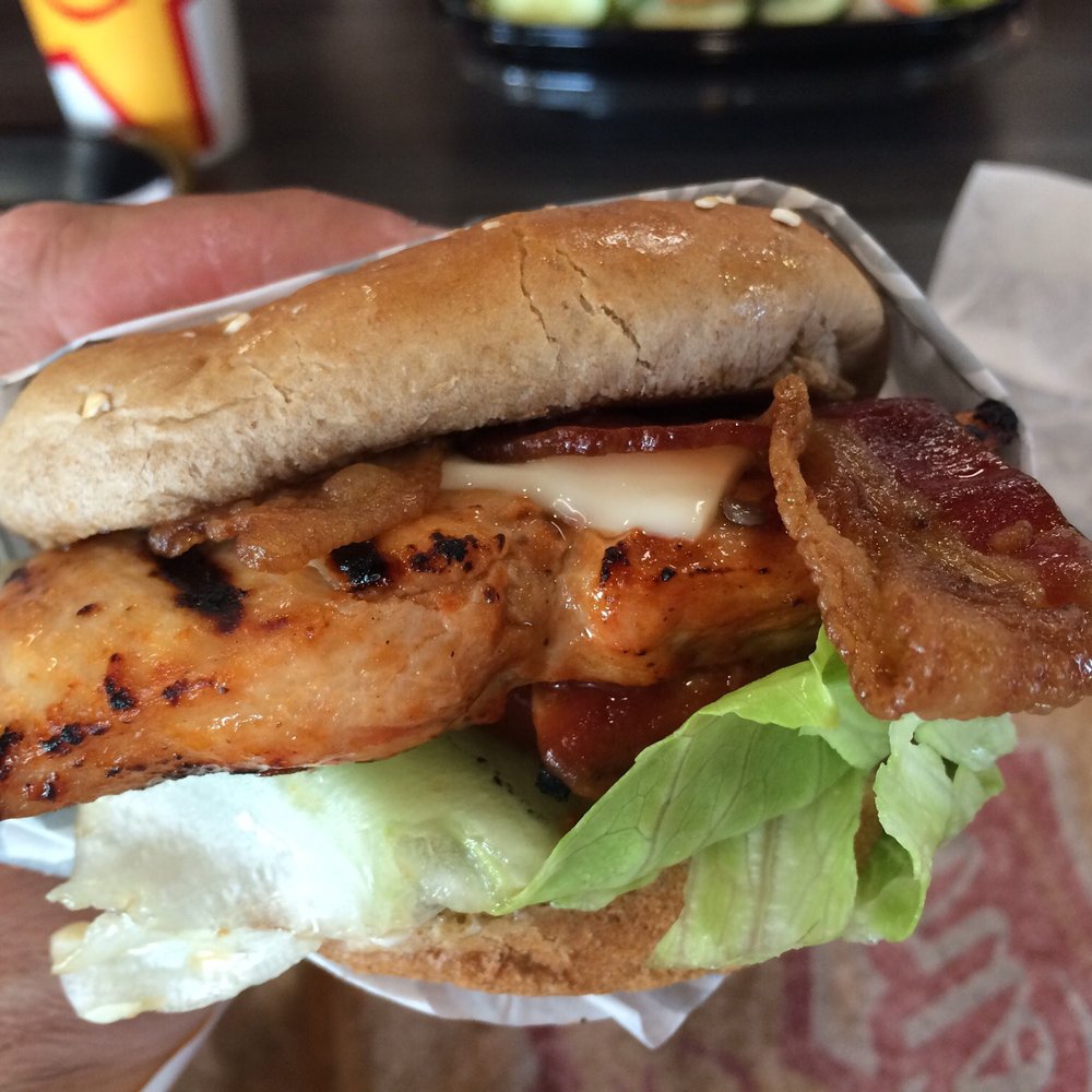 Carl's Jr - Charbroiled chicken sandwich ready to be destroyed! - Burgers Near Me - Arvin, California Carl's Jr - Charbroiled chicken sandwich ready to be destroyed! - Burgers Near Me - Arvin, California